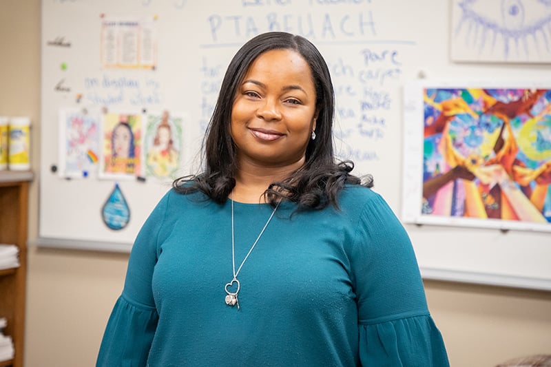 Teacher standing in front of classroom